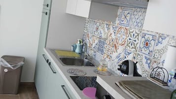 Suite monolocale Exclusive, vista mare | Cucina privata | Frigorifero