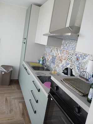 Exclusive Studio Suite, Sea View | Private kitchen - NESEA GUEST ROOMS (Reggio Calabria)