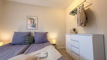 1 habitación, tabla de planchar con plancha, wifi gratis y ropa de cama