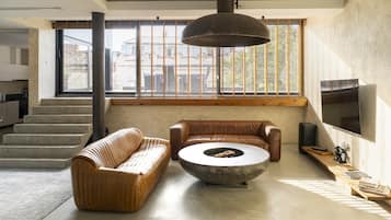 Penthouse de lujo, vista a la ciudad | Sala de estar