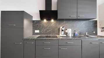 Fridge, microwave, stovetop, coffee/tea maker
