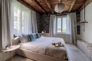 Apartment, Patio, Lake View | Premium bedding, down comforters, iron/ironing board, cribs/infant beds