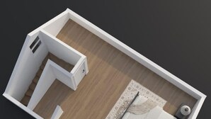 Ein 3D-Modell eines Zimmers mit einem Bett, einem Nachttisch und einer kleinen Sitzecke.