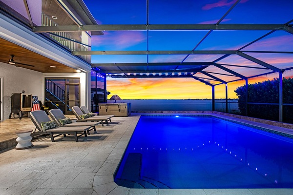 Dive into relaxation by the sparkling pool with stunning sunset views!