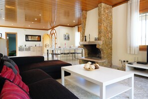 TV, fireplace - Spacious villa with private pool near the beach in Costa Brava (Sant Pere Pescador)
