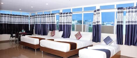 Family Quadruple Room, City View | Memory foam beds, individually furnished, free WiFi