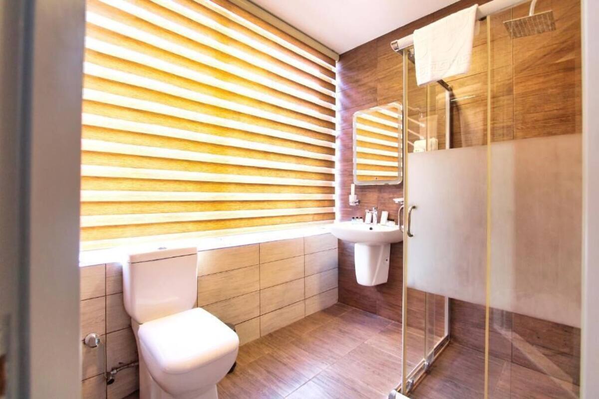 Shower, free toiletries, hair dryer, bathrobes