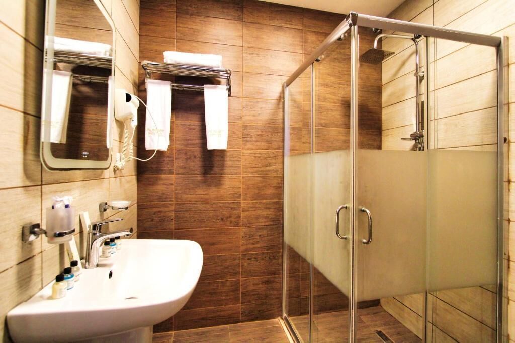 Shower, free toiletries, hair dryer, bathrobes