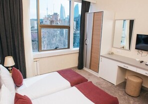 Twin Room, City View | Premium bedding, Select Comfort beds, minibar, in-room safe - Sunday INN Hotel (Baku)