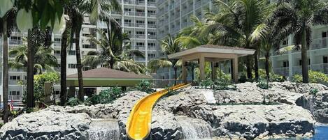 Appartement, 1 slaapkamer, toegankelijk voor mindervaliden, bubbelbad | Zwembad | Een buitenzwembad