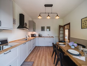 Microwave, dishwasher, dining tables