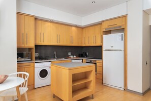 Appartamento Executive, balcone, vista città | Cucina privata