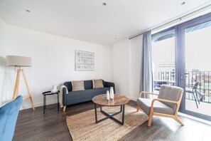 Apartment, Balcony | Living area | 37-inch TV with cable channels, Netflix, streaming services - Nice Apartment in Woolwich (London)