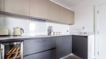 Apartment, Balcony | Private kitchen | Full-sized fridge, microwave, oven, stovetop