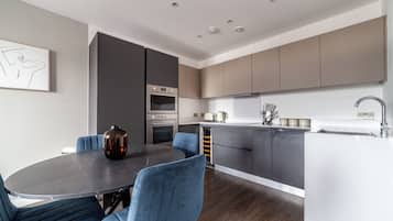 Apartment, Balcony | Private kitchen | Full-size fridge, microwave, oven, stovetop