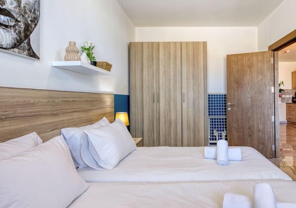 4 bedrooms, desk, iron/ironing board, travel cot