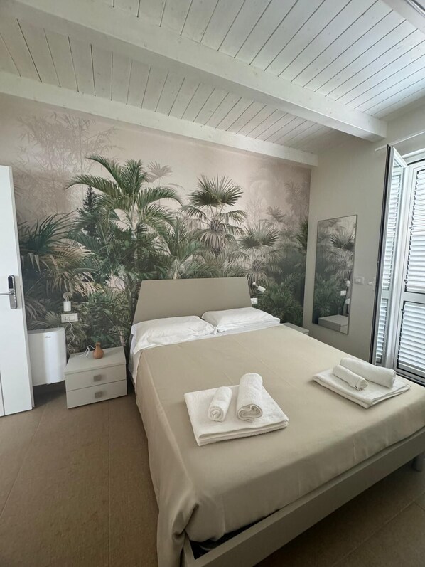 Comfort Triple Room, Balcony, Courtyard View | Desk, laptop workspace, free WiFi