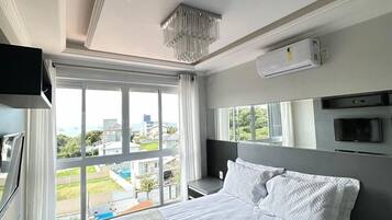 Apartamento | Wi-Fi de cortesia, roupa de cama