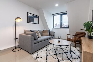 Apartment, 3 Bedrooms | Living area