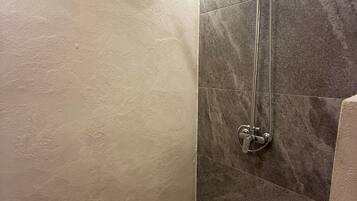 Shower, bidet, towels, soap
