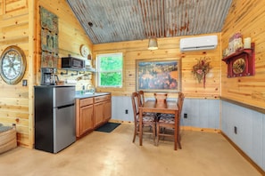Fridge, microwave, coffee/tea maker, cookware/dishes/utensils
