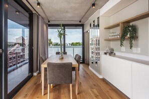 Executive Apartment, Balcony, City View | Dining room