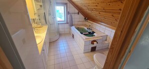 Shower, jetted bath, eco-friendly toiletries, hair dryer