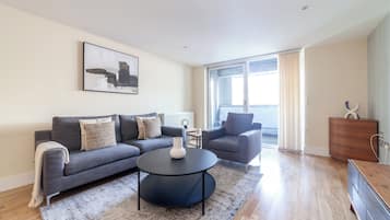 Apartment, Balcony | Living area | 32-inch flat-screen TV with cable channels, Netflix, streaming services