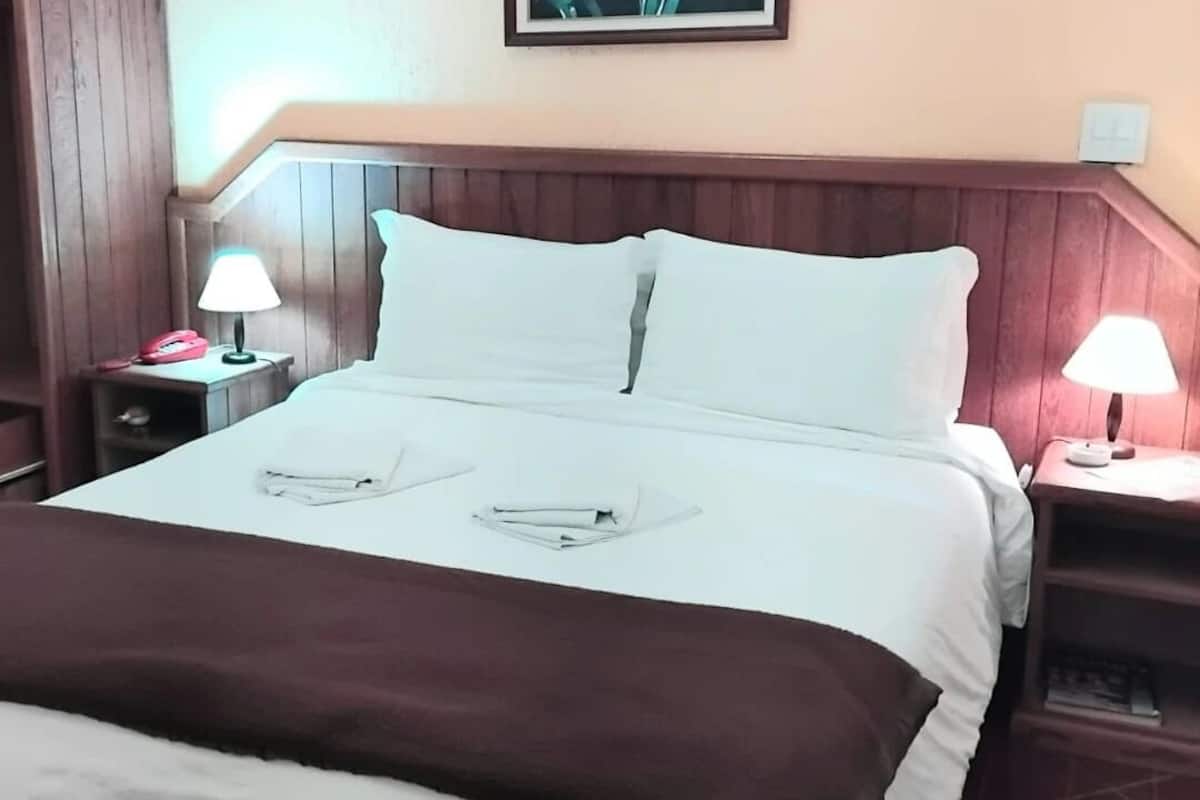 Habitación cuádruple Deluxe | Minibar, decoración personalizada y muebles diferentes