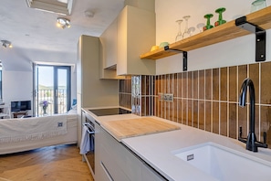 Fridge, oven, electric kettle, toaster