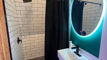 Shower, towels, soap, shampoo