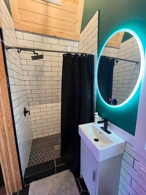 Shower, towels, soap, shampoo