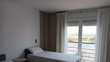 3 habitaciones, tabla de planchar con plancha, wifi y ropa de cama