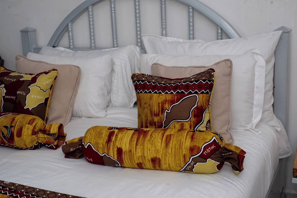 Desk, laptop workspace, blackout curtains, iron/ironing board