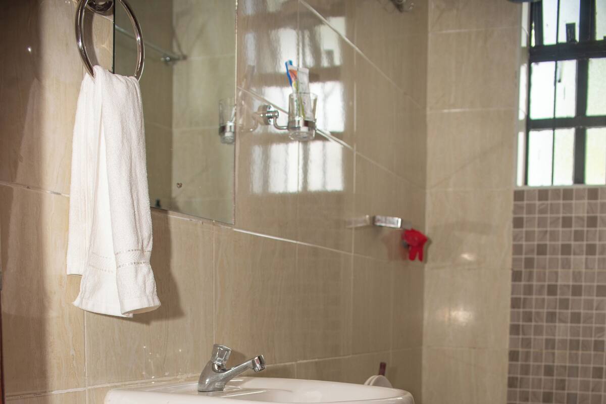 Shower, rainfall showerhead, hair dryer, slippers