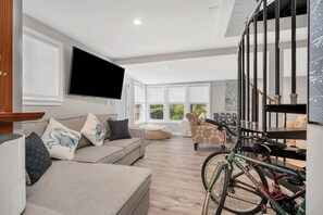 TV, fireplace, books, offices - The Lounge House | Giants Neck Beach, Water Views  and Coastal Comfort (East Lyme)