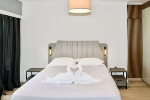 1 habitación, tabla de planchar con plancha, cuna de viaje y wifi 