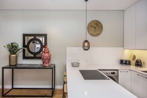 Apartamento executivo, vista para a cidade | Cozinha privada