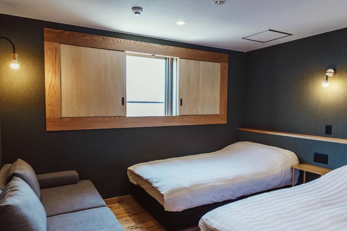 Desk, laptop workspace, free WiFi, bed sheets