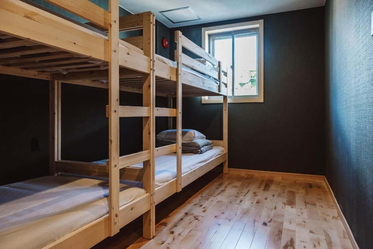 Desk, laptop workspace, free WiFi, bed sheets