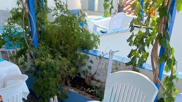 A table set for a meal with various dishes and utensils. - Saray Otel (Kas)