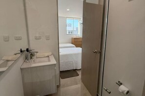 Shower, towels, soap, toilet paper