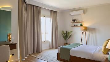 Standaard appartement, 2 slaapkamers | Een kluis op de kamer, verduisterende gordijnen