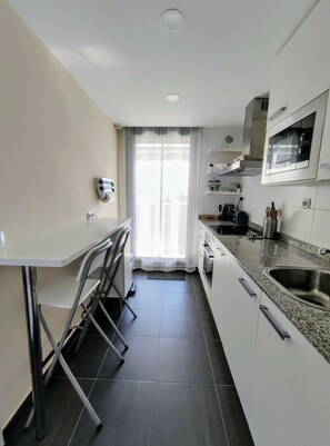 Réfrigérateur, micro-ondes, four, lave-vaisselle