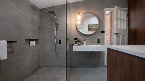 Shower, hair dryer, towels