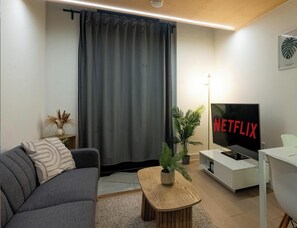 公寓, 1 間臥室, 陽台, 城市景觀 | 客廳 | 書籍