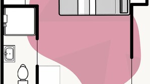 A hotel room layout with a bed, a desk, a chair, a toilet, and a sink. - Camden | Room B3 - Studio Apartment, Sleeps 2 (London)