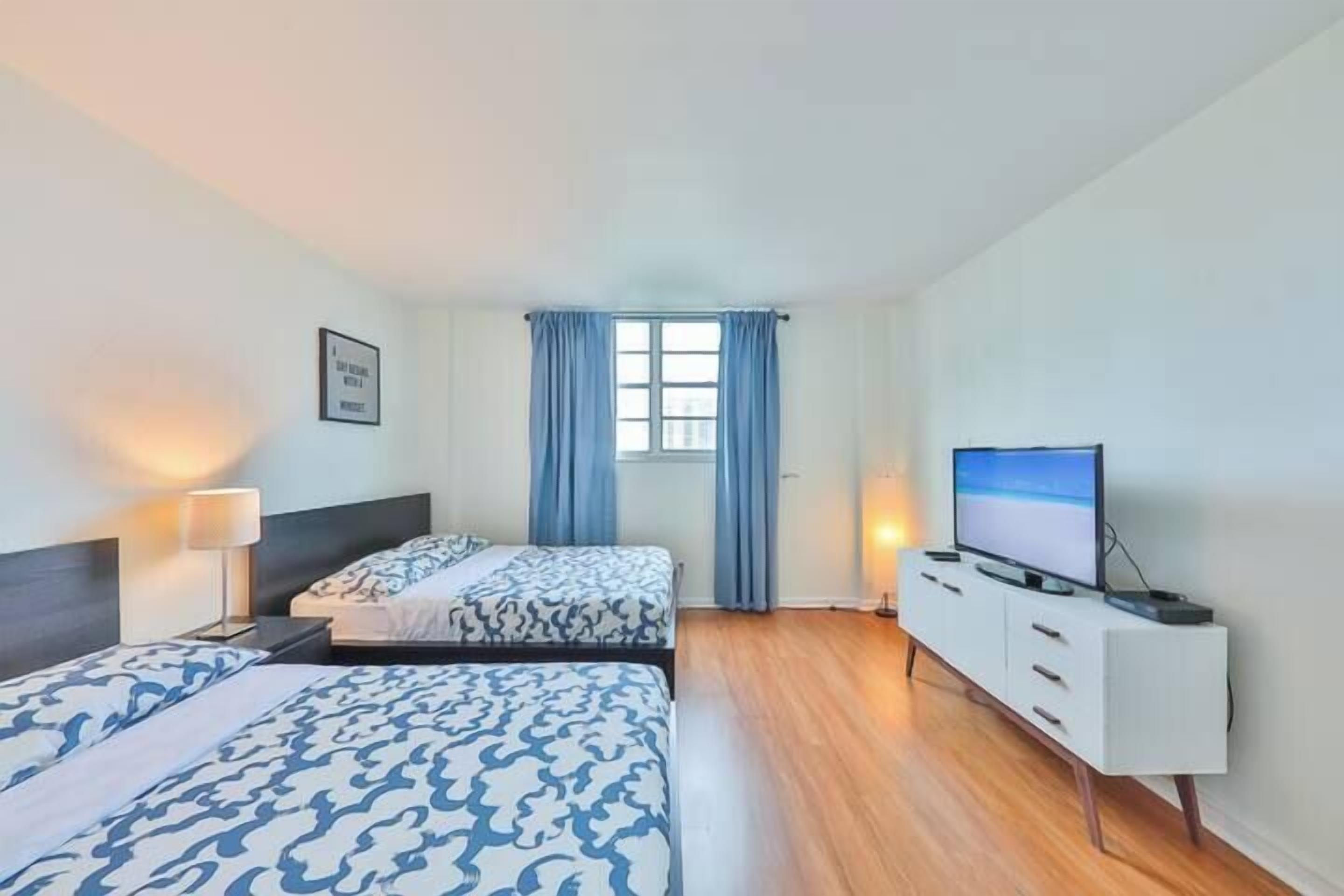 1 bedroom, desk, iron/ironing board, travel cot