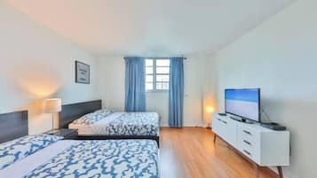 1 bedroom, desk, iron/ironing board, travel cot