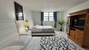 2 bedrooms, desk, iron/ironing board, travel crib